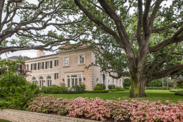 Front facade and grounds of Chevy Chase Residence, Houston, TX.