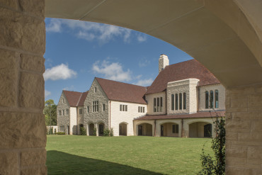 Exterior facade of Flores Hall as viewed from the courtyard, designed by Curtis & Windham Architects for the Saint Johns School in Houston, TX.