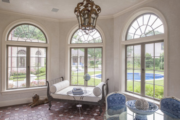 Chevy Chase Residence sun room with view to grounds and pool, Houston, TX