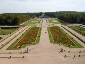 View of the gardens at Vaux le Vicomte with reflecting basins in the distance.